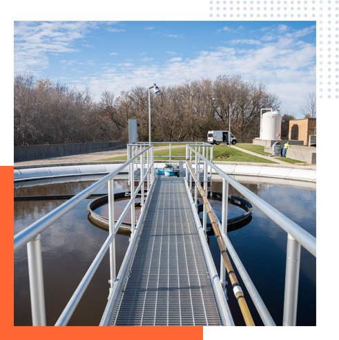 An expert overseeing wastewater treatment process at a plant